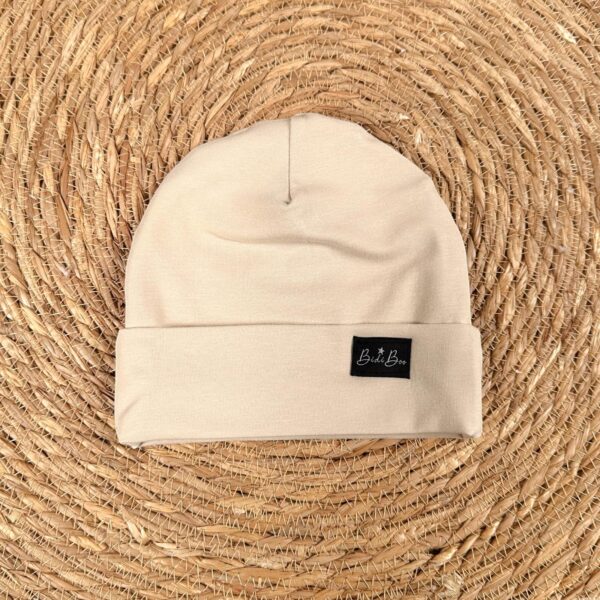 Bonnet mi-saison beige 6-12 mois