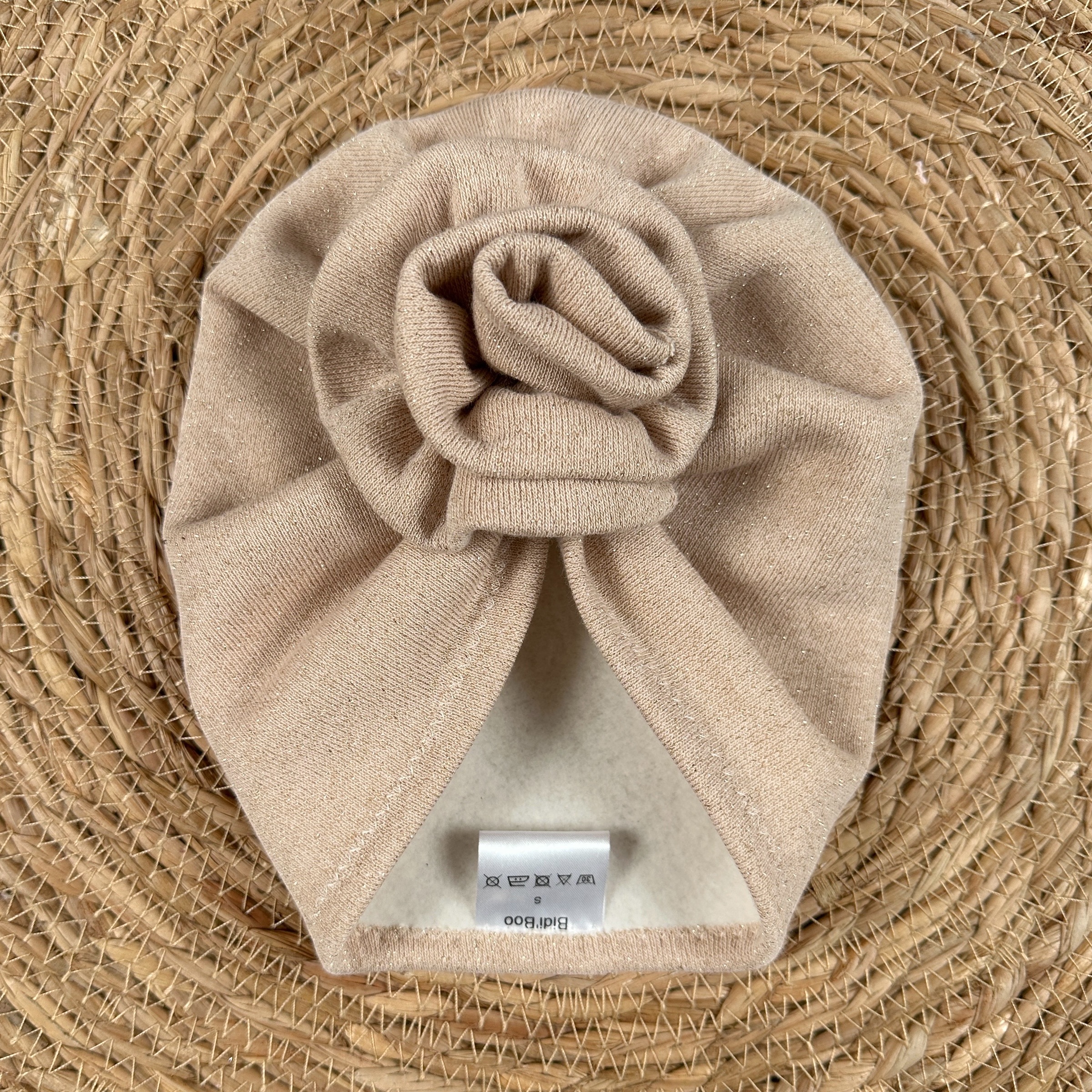 Turban fleur beige brillant