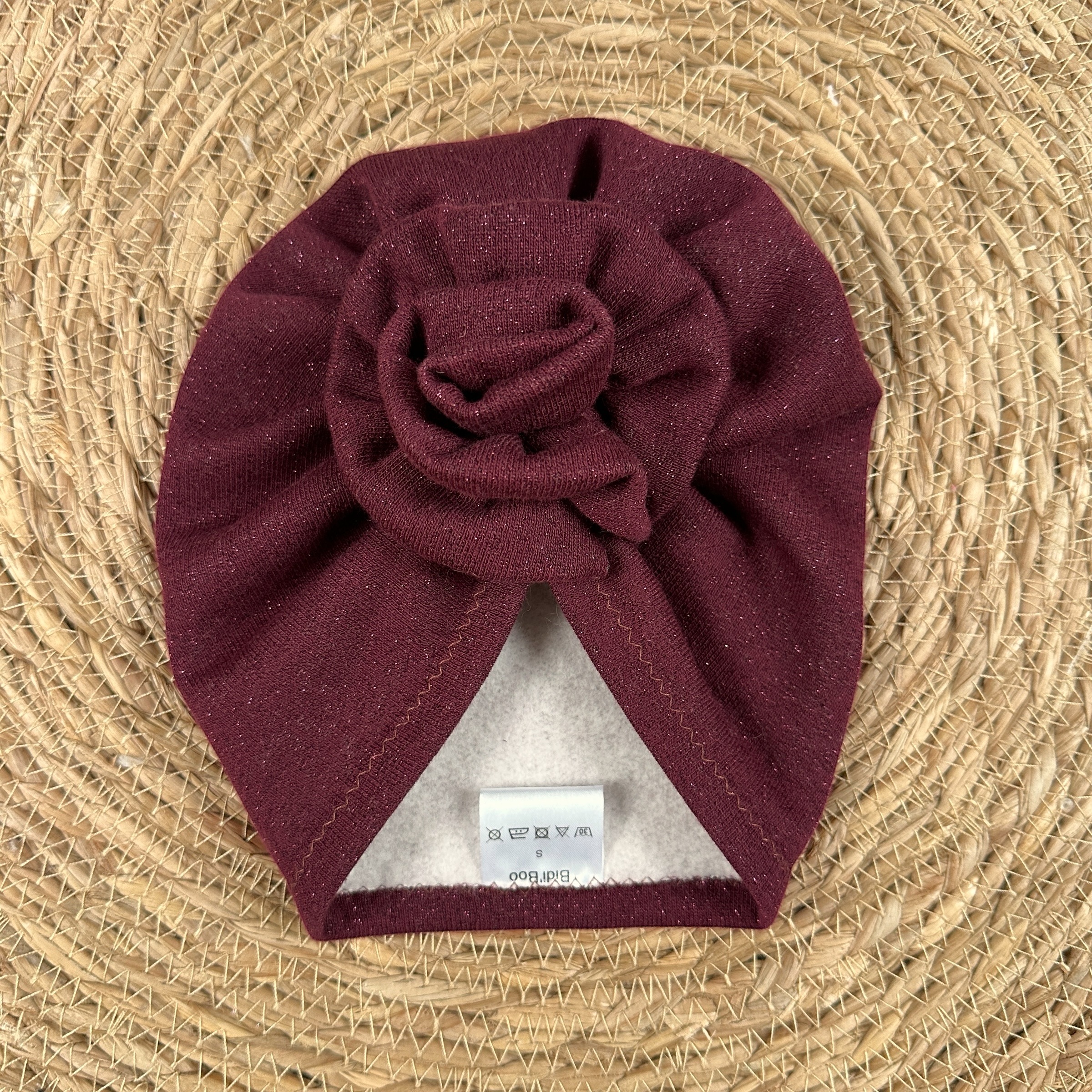 Turban fleur bordeaux brillant