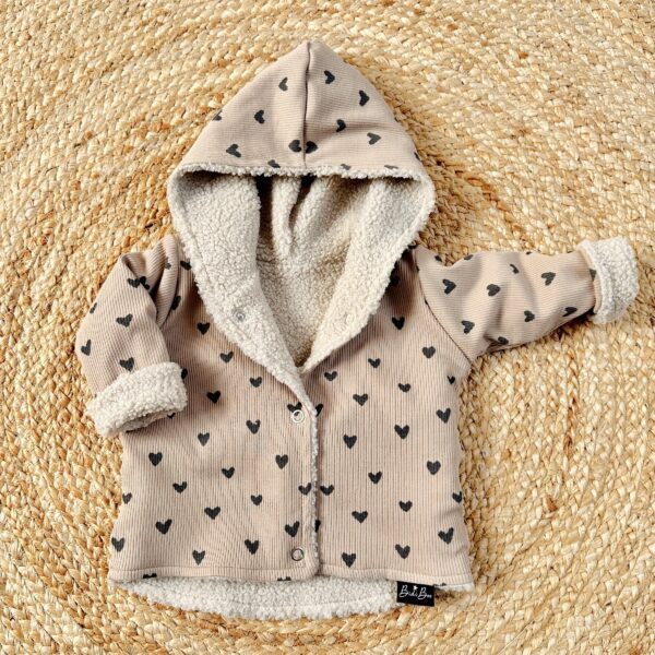 Manteau réversible coeur